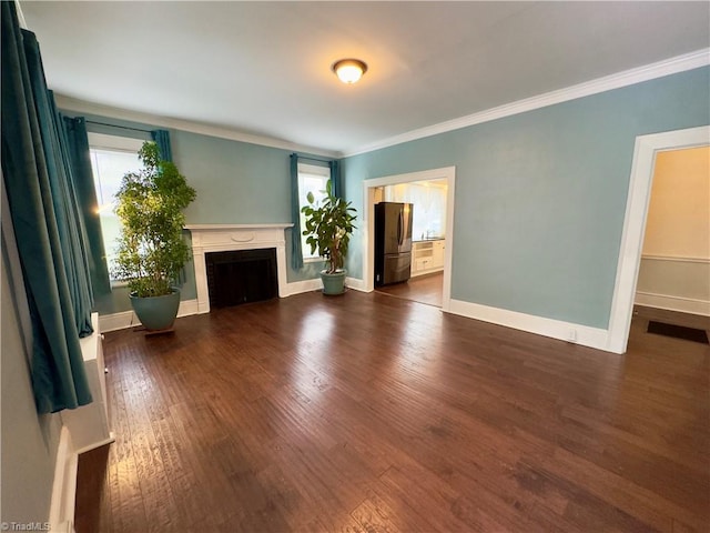 216 Rawley Ave, Mount Airy, NC 27030 - unfurnished living room featuring ornamental molding, dark wood-style floors, a fireplace, and baseboards
