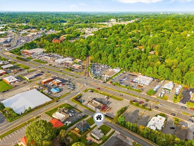 drone / aerial view with a forest view