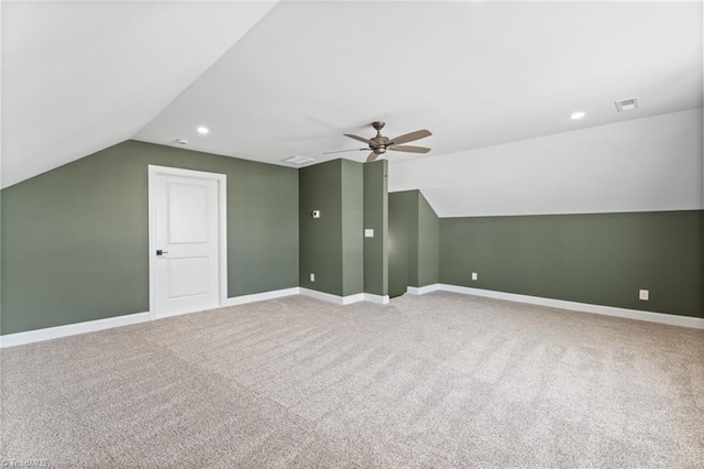 bonus room with carpet, visible vents, and baseboards