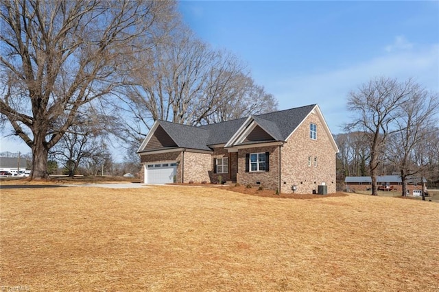 view of front of house with brick siding, roof with shingles, central air condition unit, crawl space, and a garage