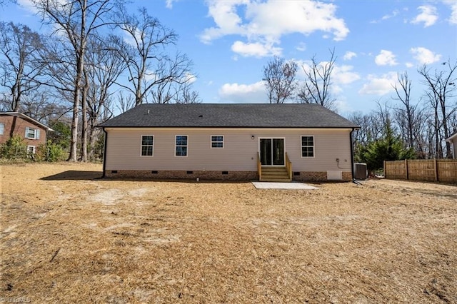 back of house with entry steps, cooling unit, fence, and crawl space