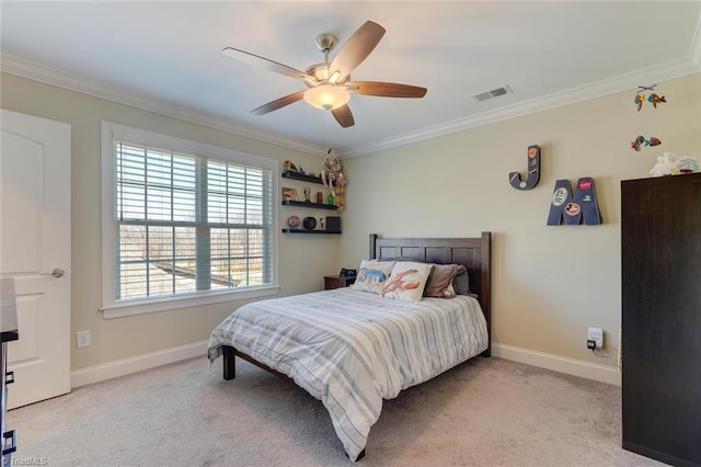 carpeted bedroom featuring ornamental molding and ceiling fan