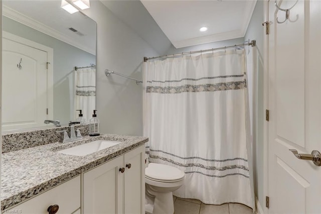 bathroom featuring tile patterned flooring, vanity, crown molding, and toilet