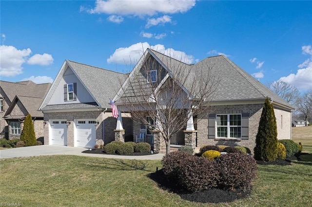 view of front of home with a garage and a front yard