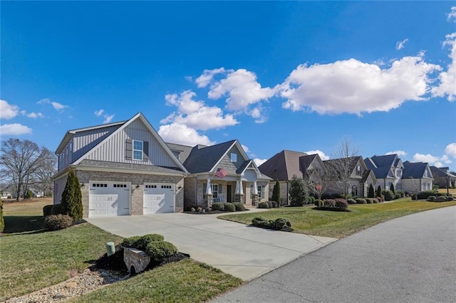 view of front of house featuring a garage and a front lawn