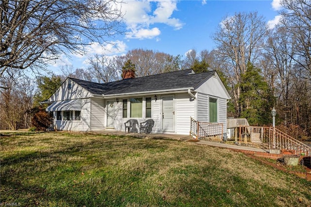 exterior space with a front yard