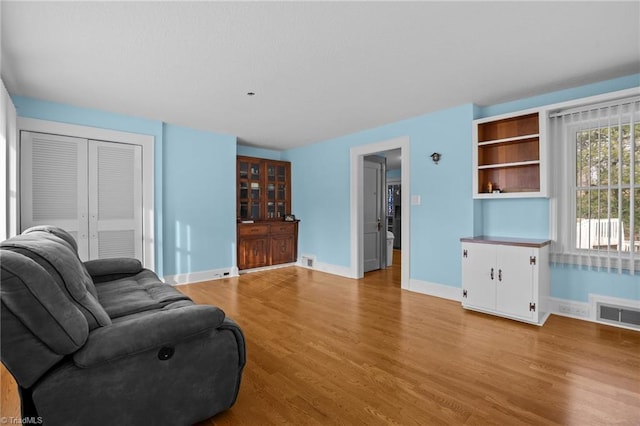 living room featuring light wood-type flooring