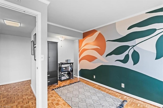 exercise room with ornamental molding and parquet flooring