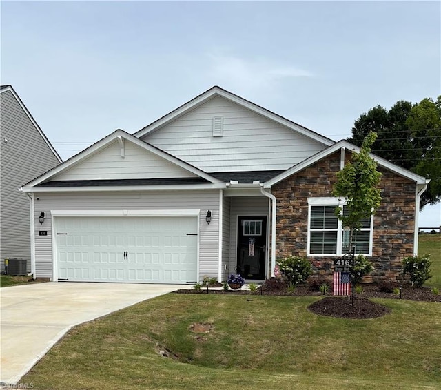 416 Bryson Blvd, Lexington, NC 27295 - view of front of home with a garage, driveway, a front yard, and stone siding