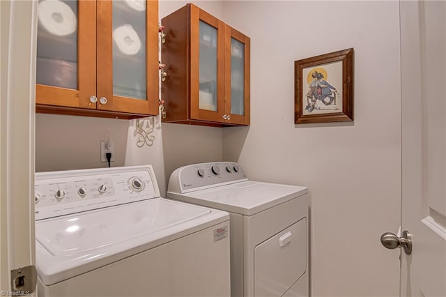 416 Bryson Blvd, Lexington, NC 27295 - washroom with washing machine and clothes dryer and cabinet space