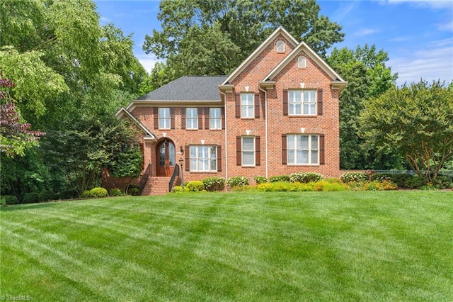 4607 Eden Bridge Dr, Kernersville, NC 27284 - view of front of home featuring a front lawn and brick siding