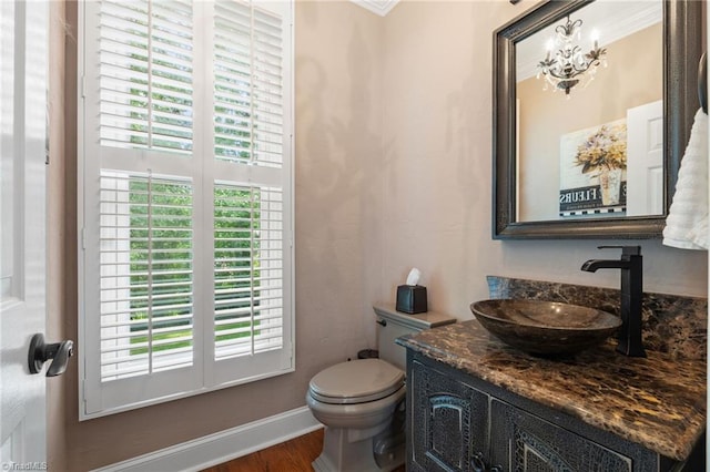 4607 Eden Bridge Dr, Kernersville, NC 27284 - half bath with vanity, plenty of natural light, wood finished floors, and a chandelier