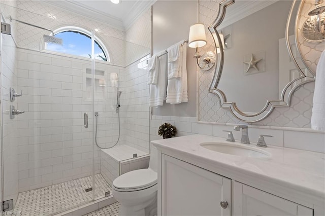 4607 Eden Bridge Dr, Kernersville, NC 27284 - full bathroom featuring crown molding, vanity, a stall shower, and tile walls