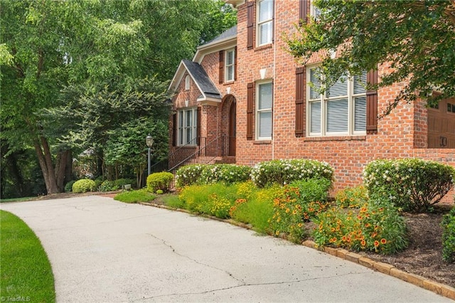 4607 Eden Bridge Dr, Kernersville, NC 27284 - view of front facade with brick siding