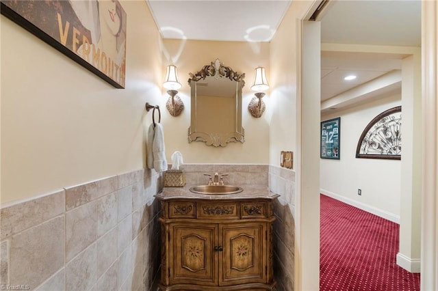 4607 Eden Bridge Dr, Kernersville, NC 27284 - bathroom with vanity, tile walls, wainscoting, and recessed lighting