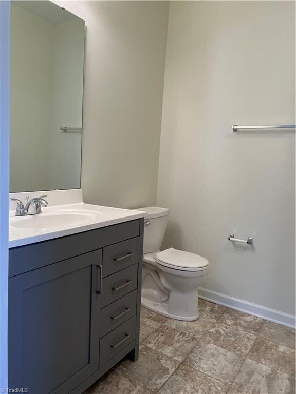 2607 Pennoak Way Unit H, Greensboro, NC 27407 - bathroom featuring vanity and stone finish floors