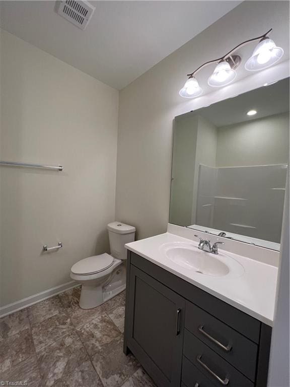 2607 Pennoak Way Unit H, Greensboro, NC 27407 - bathroom featuring vanity and toilet