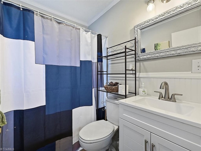 full bath with ornamental molding, a shower with curtain, vanity, and toilet