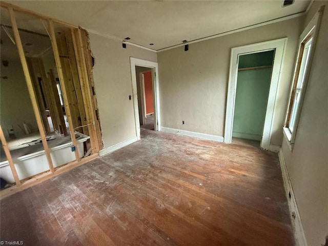 302 Louise Ave, High Point, NC 27262 - unfurnished bedroom with hardwood / wood-style floors, crown molding, and baseboards