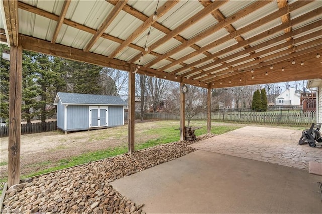 view of patio / terrace with a storage unit