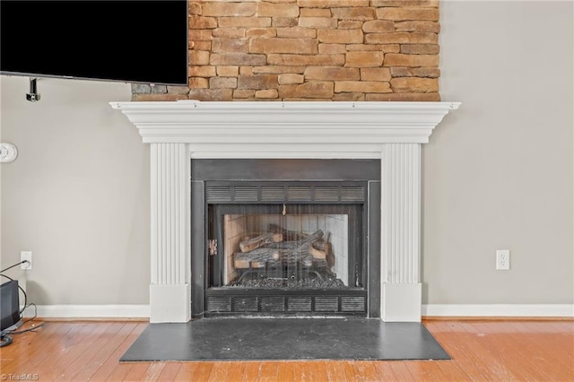 interior details with hardwood / wood-style flooring