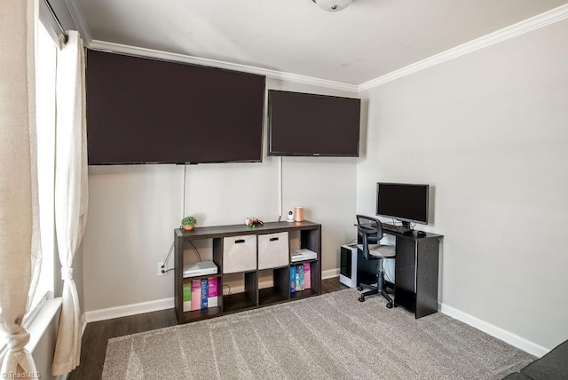 office space with wood finished floors, baseboards, and ornamental molding