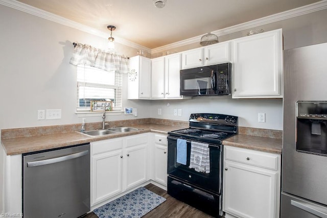 kitchen featuring dark wood finished floors, white cabinets, black appliances, and a sink