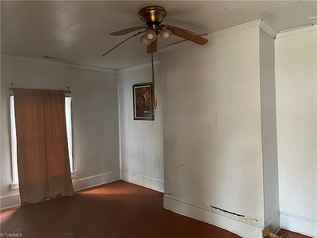 unfurnished room with ceiling fan and crown molding