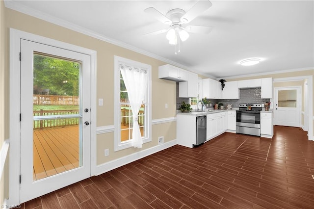 2305 Hunters Ridge Dr, Pleasant Garden, NC 27313 - kitchen featuring stainless steel appliances, a sink, light countertops, crown molding, and white cabinetry