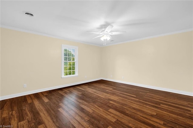 2305 Hunters Ridge Dr, Pleasant Garden, NC 27313 - unfurnished room featuring crown molding, baseboards, dark wood-type flooring, and a ceiling fan