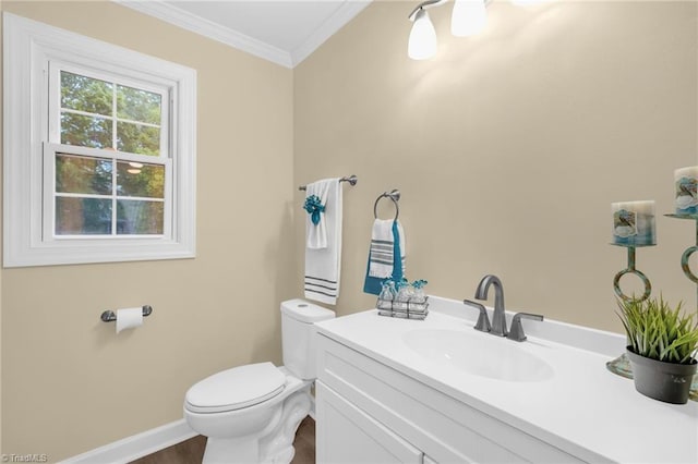 2305 Hunters Ridge Dr, Pleasant Garden, NC 27313 - half bath with toilet, ornamental molding, vanity, baseboards, and wood finished floors