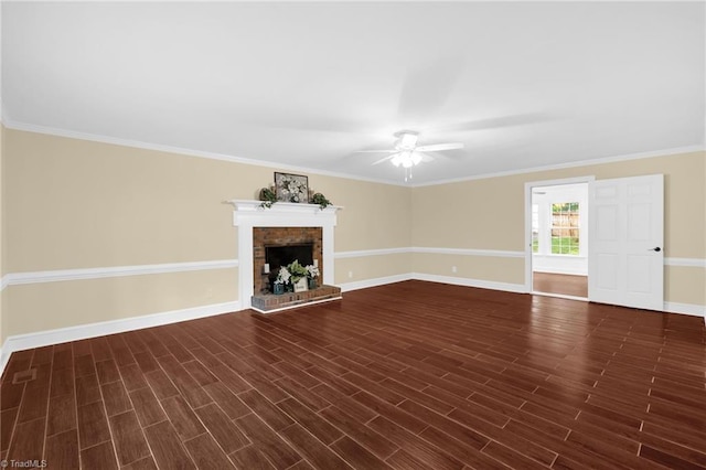 2305 Hunters Ridge Dr, Pleasant Garden, NC 27313 - unfurnished living room with a ceiling fan, baseboards, a brick fireplace, dark wood-style flooring, and ornamental molding