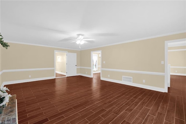 2305 Hunters Ridge Dr, Pleasant Garden, NC 27313 - unfurnished living room with ceiling fan, baseboards, dark wood-style floors, and ornamental molding