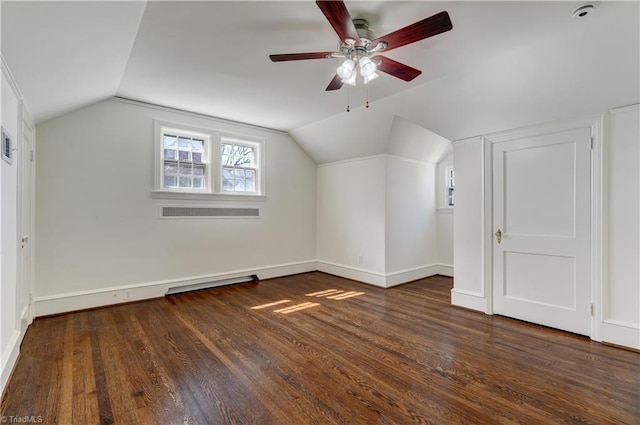 bonus room with wood finished floors, a ceiling fan, and vaulted ceiling