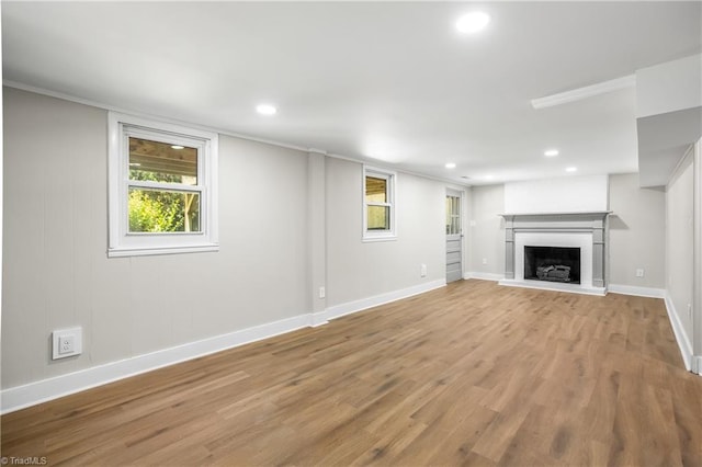 unfurnished living room featuring light hardwood / wood-style floors