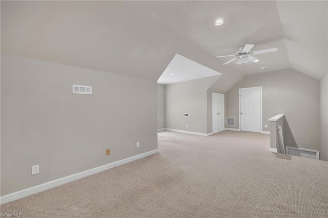 bonus room with baseboards, ceiling fan, light carpet, vaulted ceiling, and recessed lighting