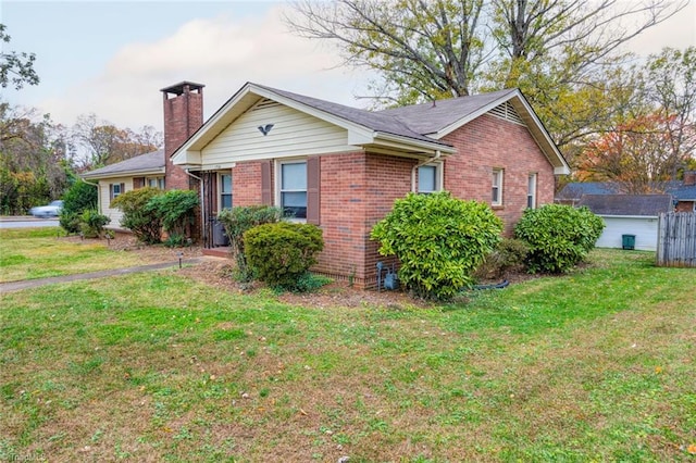 view of front of home with a front lawn