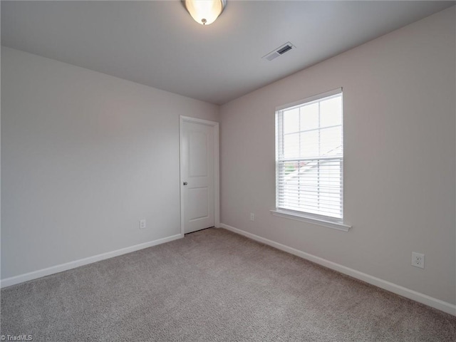 spare room with carpet flooring