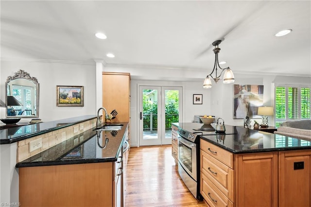 5017 Timbrook Ln, Winston-Salem, NC 27103 - kitchen featuring stainless steel range with electric stovetop, a sink, ornamental molding, dark stone countertops, and open floor plan