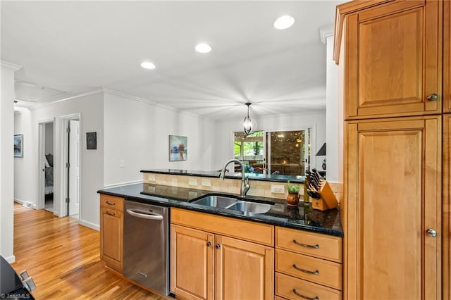 5017 Timbrook Ln, Winston-Salem, NC 27103 - kitchen with stainless steel dishwasher, a sink, ornamental molding, light wood-type flooring, and dark stone counters