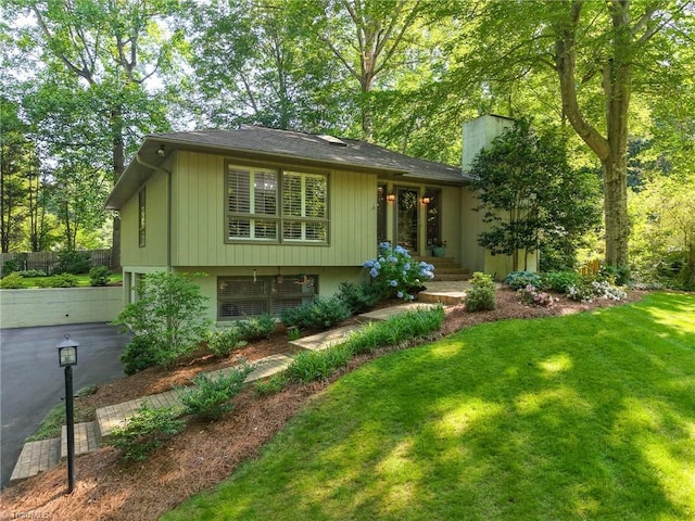5017 Timbrook Ln, Winston-Salem, NC 27103 - view of front of house featuring a chimney