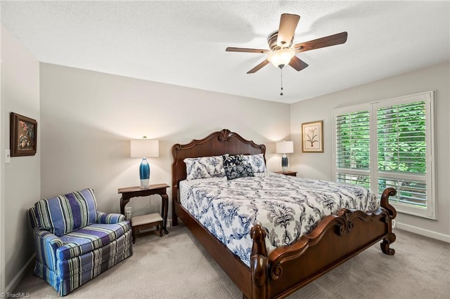 5017 Timbrook Ln, Winston-Salem, NC 27103 - carpeted bedroom with ceiling fan and baseboards