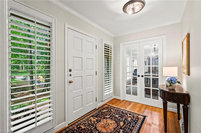 5017 Timbrook Ln, Winston-Salem, NC 27103 - entryway with french doors, light wood-style floors, crown molding, and plenty of natural light