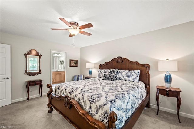 5017 Timbrook Ln, Winston-Salem, NC 27103 - bedroom featuring light carpet, baseboards, a ceiling fan, and connected bathroom