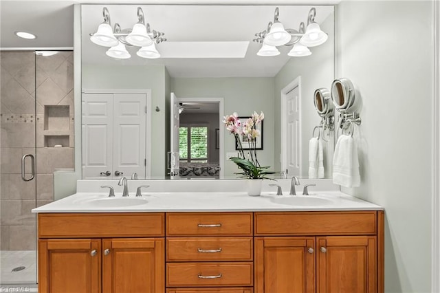 5017 Timbrook Ln, Winston-Salem, NC 27103 - bathroom with a stall shower, double vanity, and a chandelier