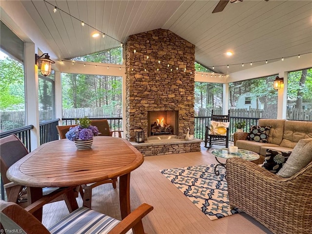 5017 Timbrook Ln, Winston-Salem, NC 27103 - sunroom / solarium with lofted ceiling, hardwood / wood-style floors, wood ceiling, an outdoor living space with a fireplace, and ceiling fan