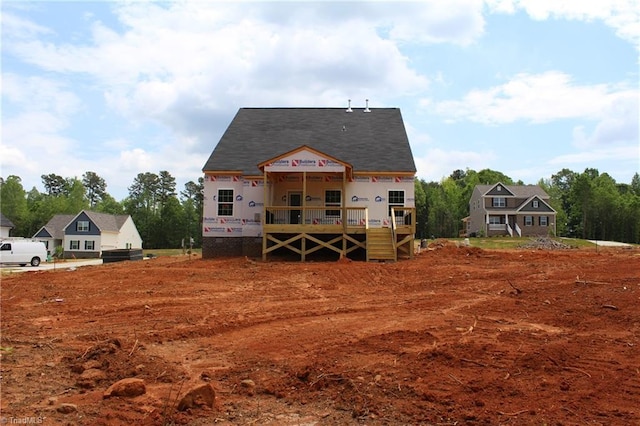 property in mid-construction featuring a deck