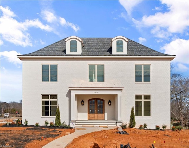 view of front facade featuring french doors