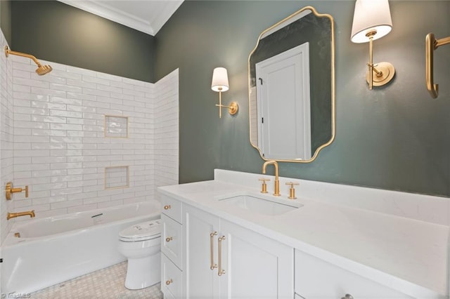 full bathroom featuring toilet, vanity, crown molding, and tiled shower / bath combo