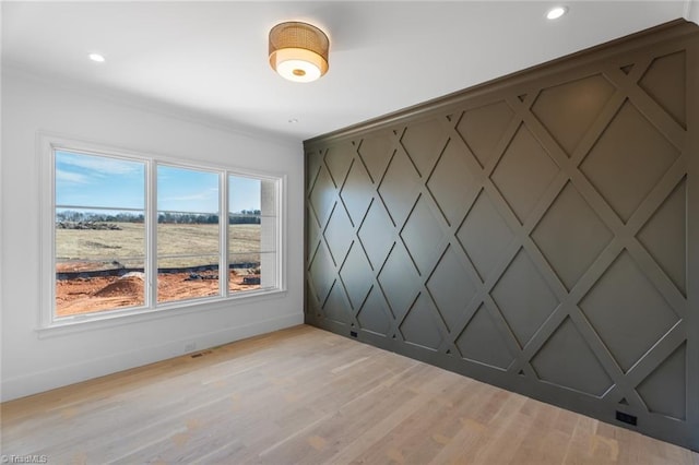 unfurnished room featuring light wood-type flooring